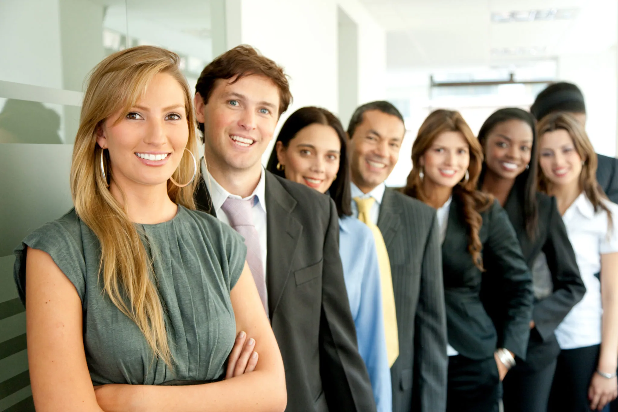 Group of smiling corporate employees